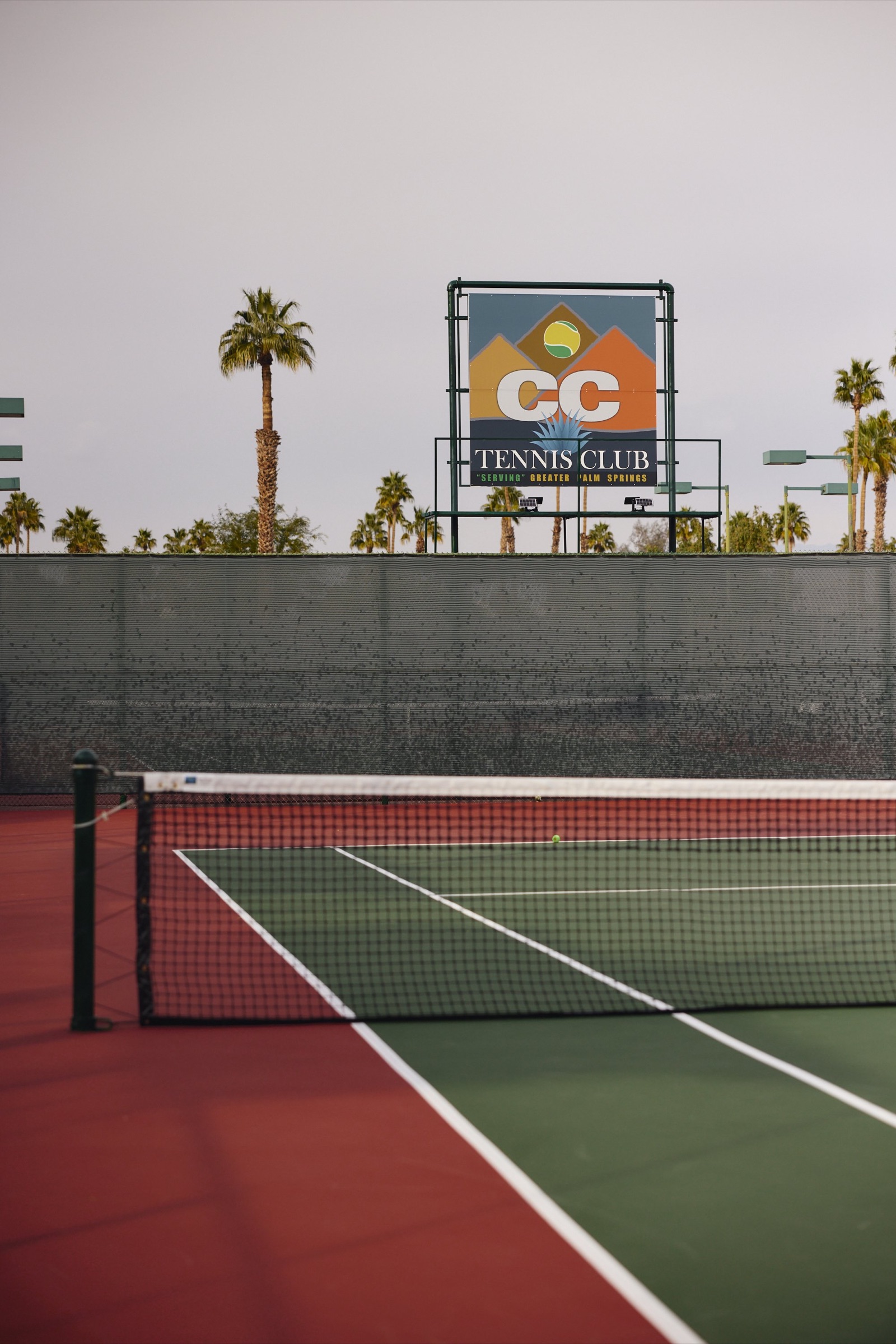Players gathered courtside at CC Tennis Club