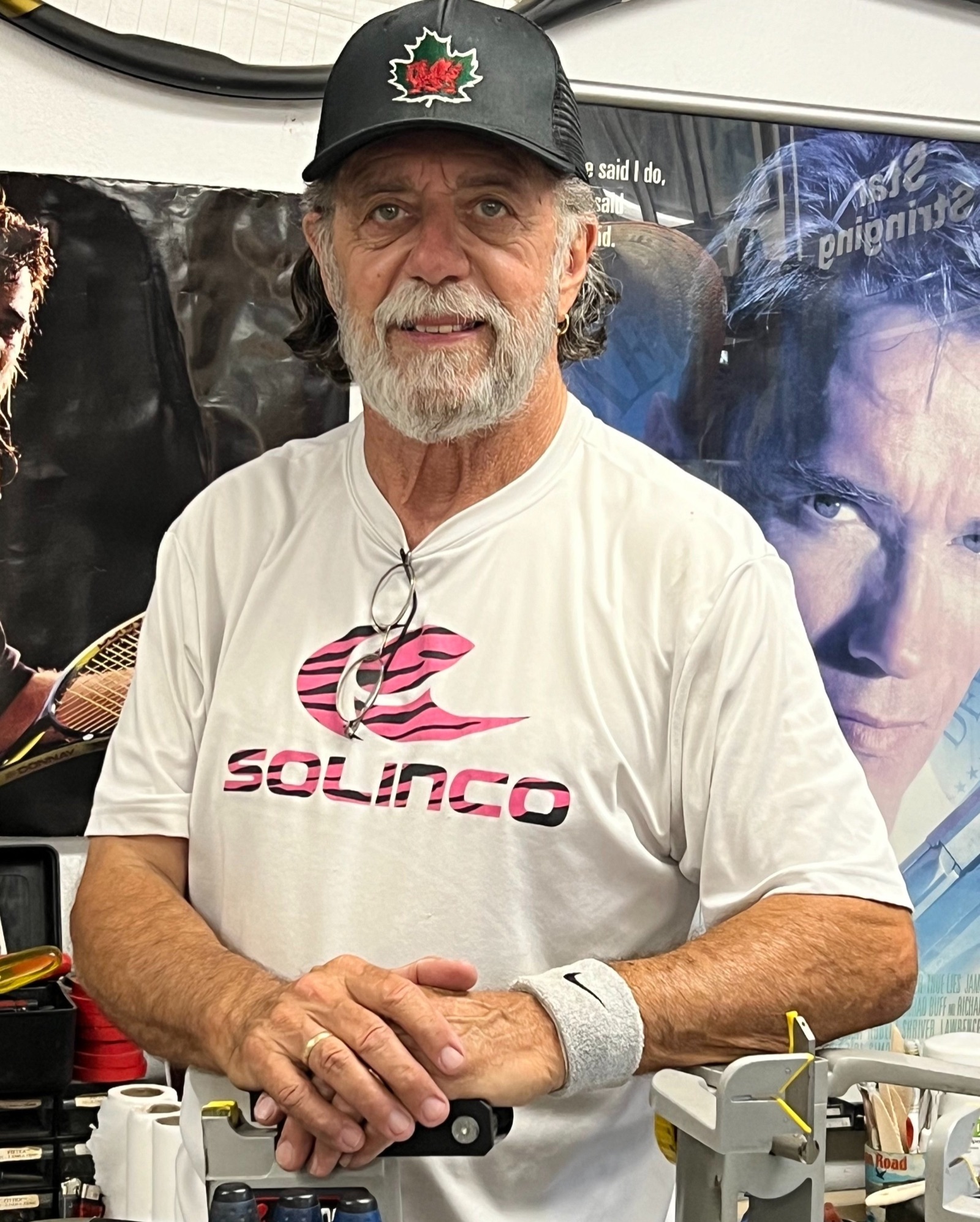 David Mindell, Club Director and stringing expert, on court